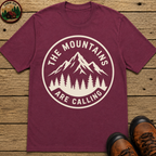 The Mountains Are Calling — Vintage Hiking Outdoor Badge Tee