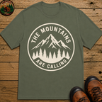 The Mountains Are Calling — Vintage Hiking Outdoor Badge Tee