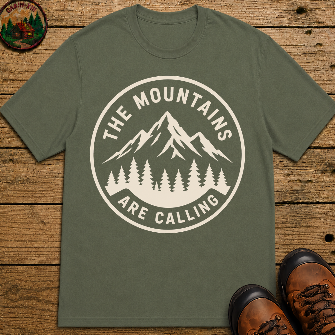 The Mountains Are Calling — Vintage Hiking Outdoor Badge Tee