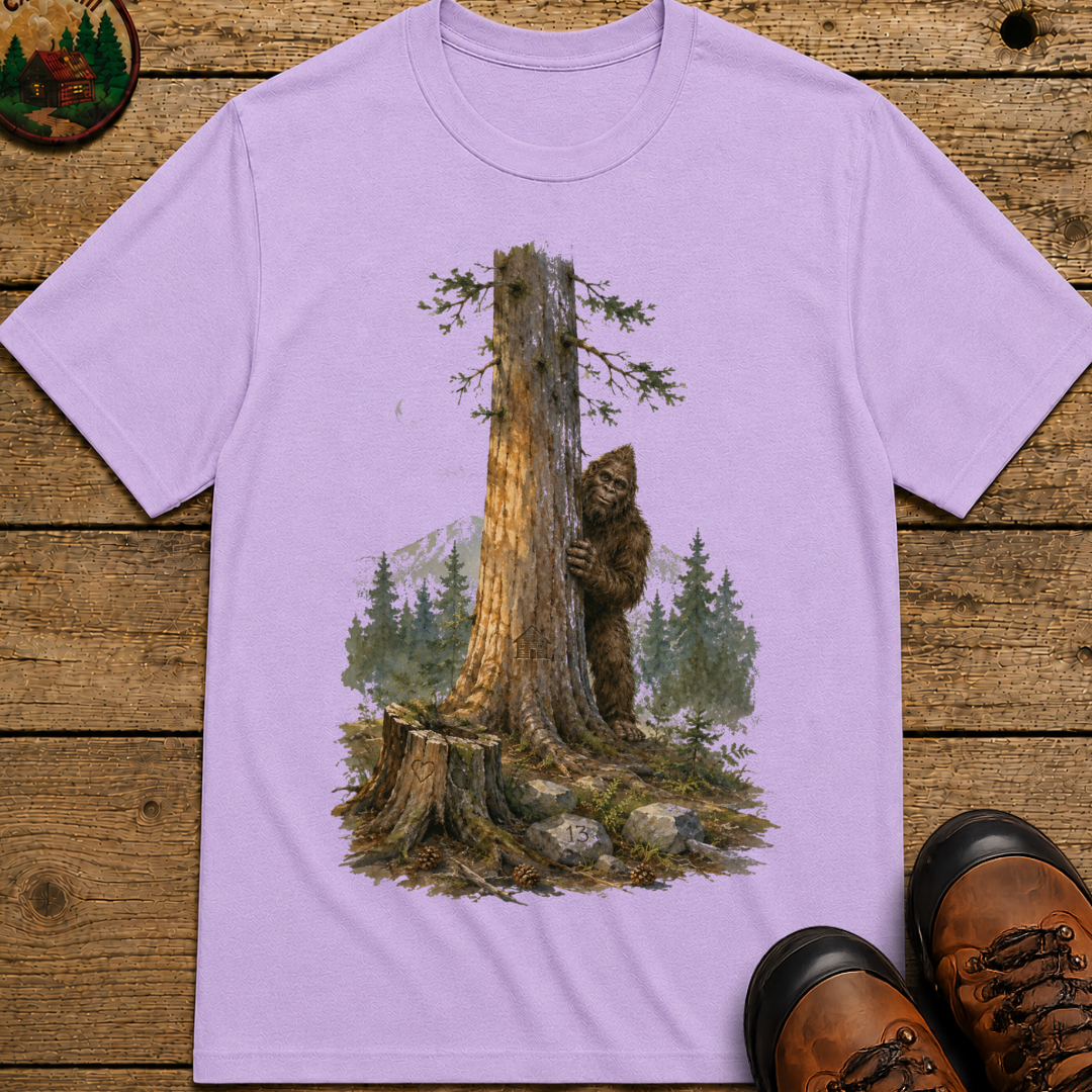 Bigfoot Hiding Behind a Tree Shirt — Watercolor Sasquatch Outdoor Tee