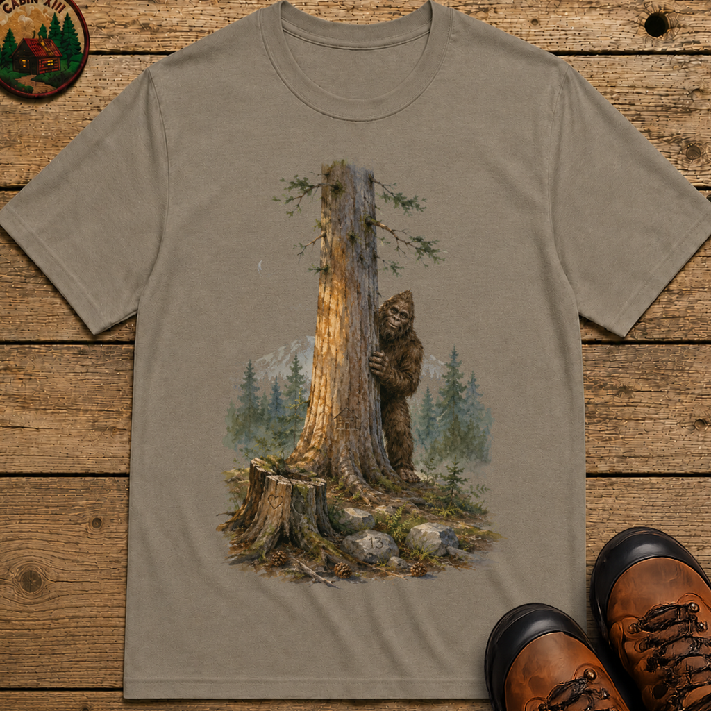 Bigfoot Hiding Behind a Tree Shirt — Watercolor Sasquatch Outdoor Tee