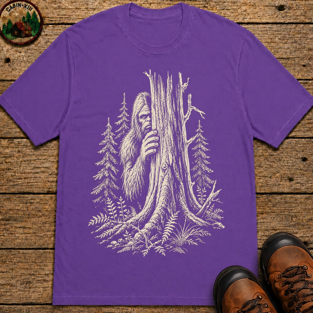 Bigfoot Hiding — Vintage Sasquatch Forest Sketch Tee - Grape