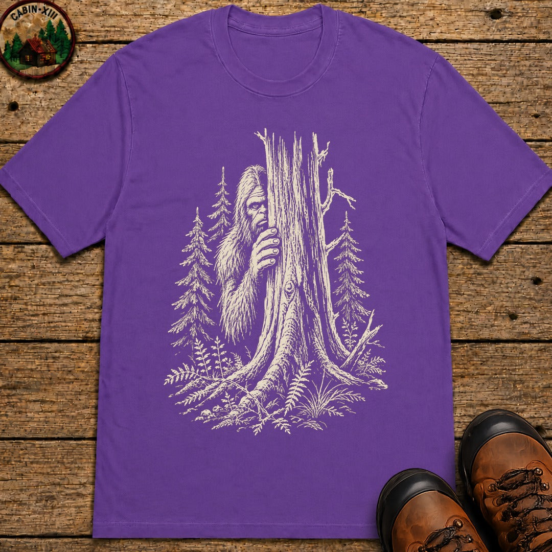 Bigfoot Hiding — Vintage Sasquatch Forest Sketch Tee - Grape