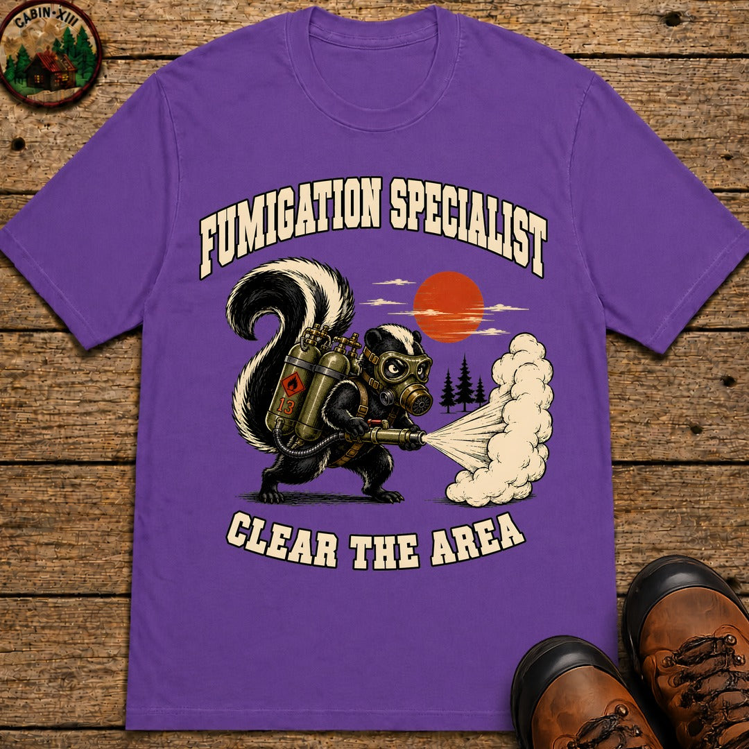Fumigation Specialist Clear the Area — Skunk Outdoor Humor Tee - Grape