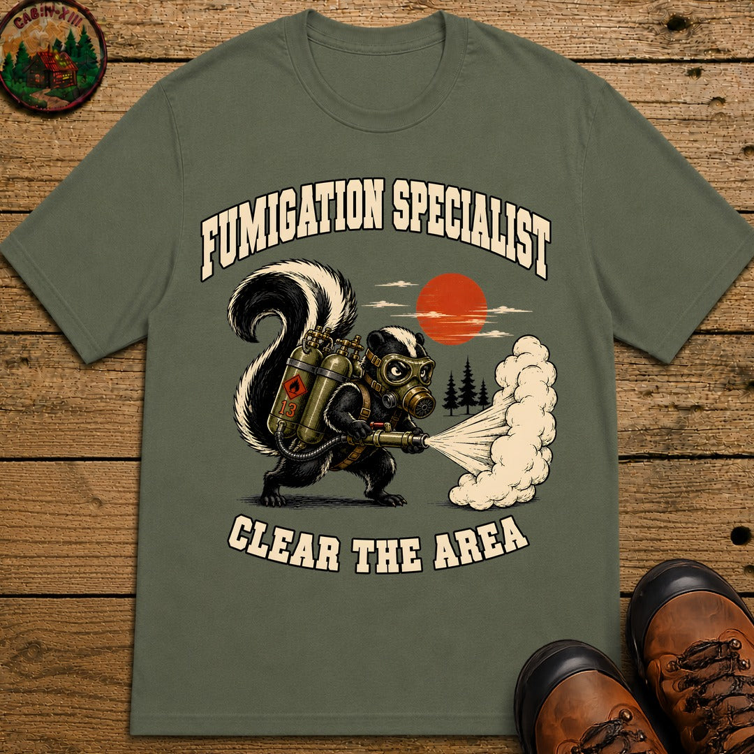 Fumigation Specialist Clear the Area — Skunk Outdoor Humor Tee - Moss