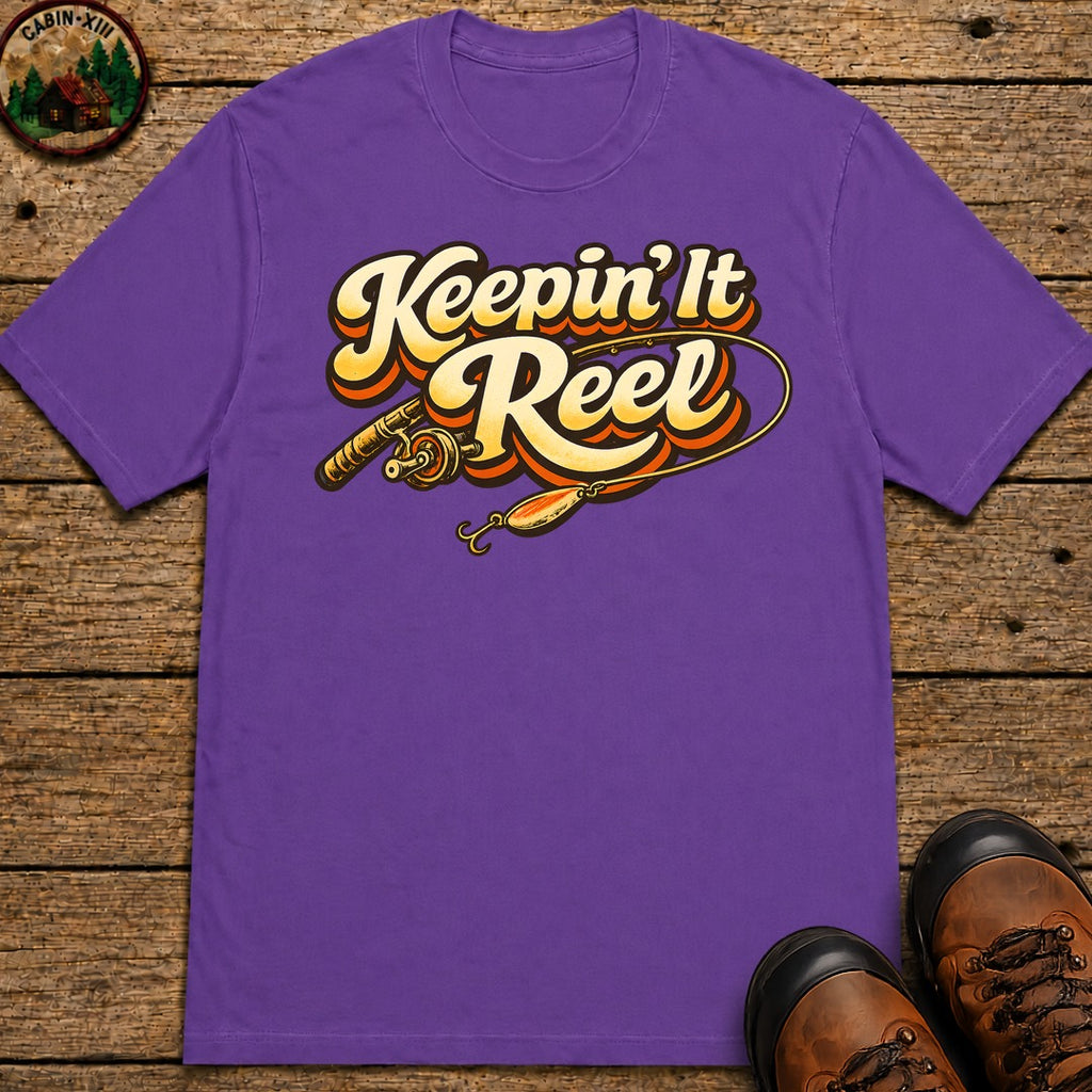 Keepin' It Reel — Retro Fishing Humor Tee - Grape