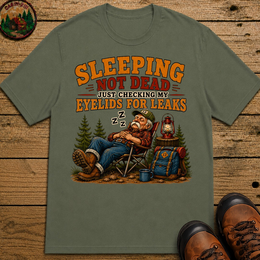 Sleeping Not Dead Just Checking the Eyelids for Leaks Funny Tee - Moss